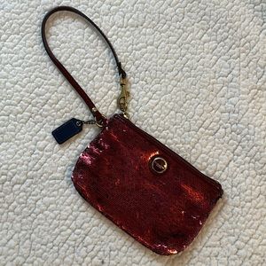 Small red sequin coach wristlet